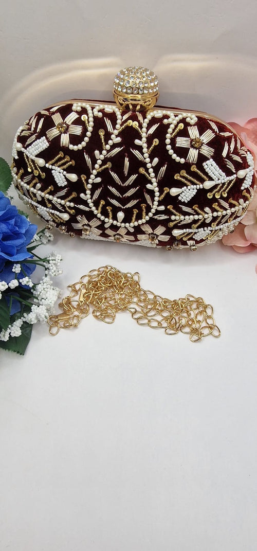 Embroidered Oval Clutch